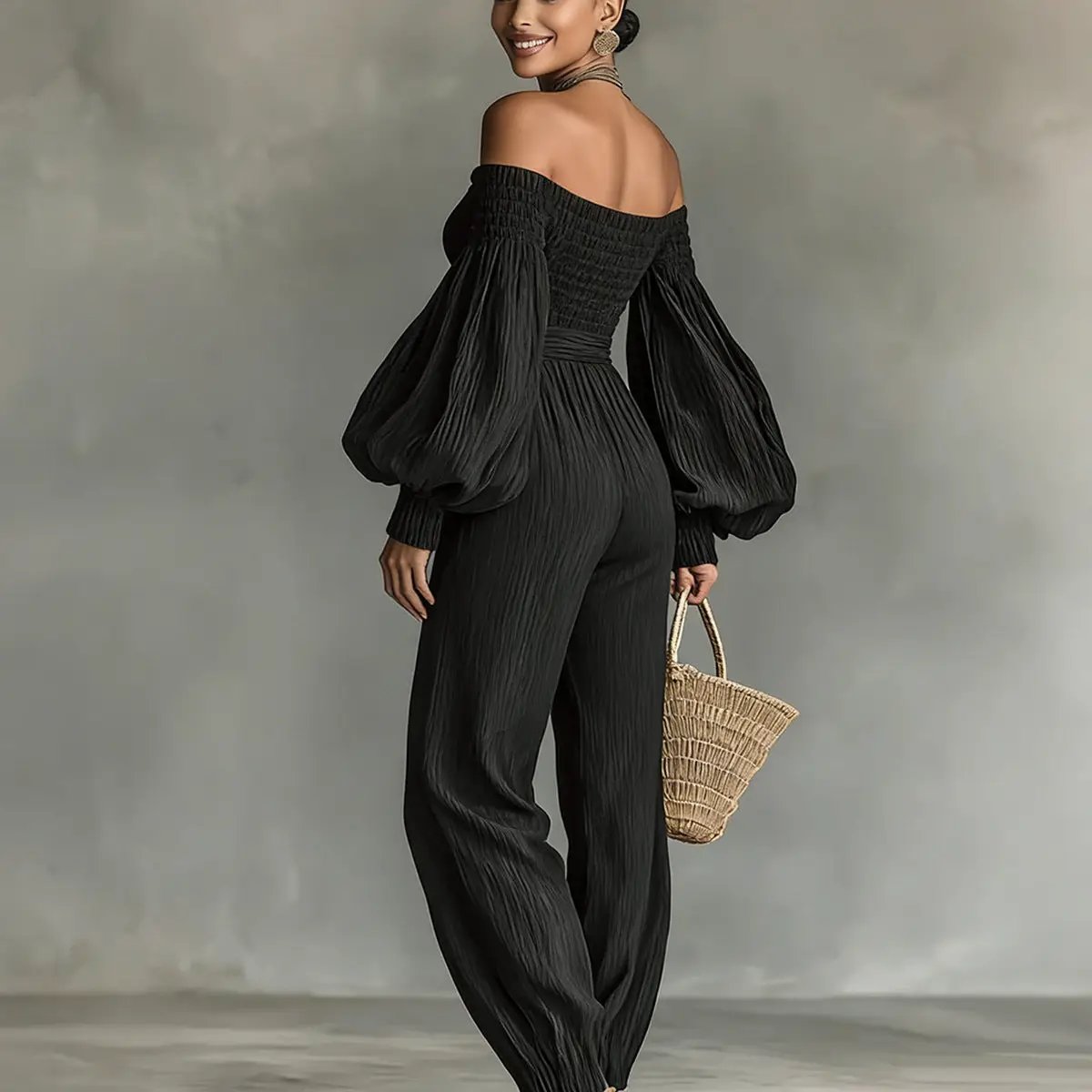 Style Off-Shoulder Lantern Sleeve Pleated Loose Jumpsuit for Women in black with smocked bodice and wide lantern sleeves.