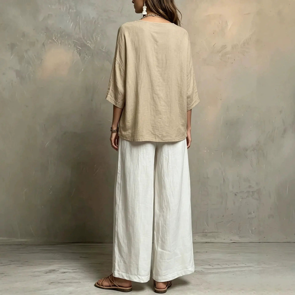 Bohemian style loose elegant 2-piece set by eprolo: beige tunic top with wide sleeves and white pants, back view