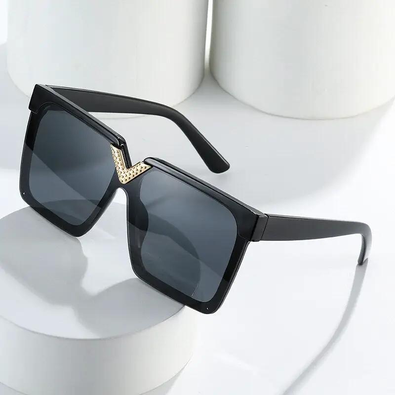 One Piece square V-shaped sunglasses with black frame, gold rhinestone V bridge and gradient lenses
