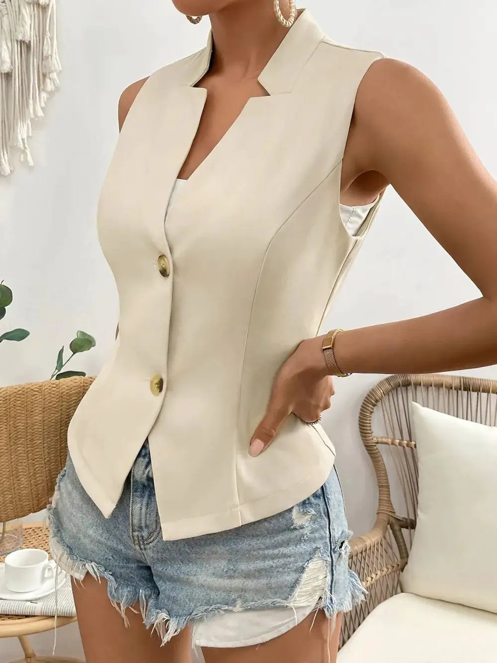 Button Down Vest Coat by eprolo, beige sleeveless tailored vest with gold buttons.