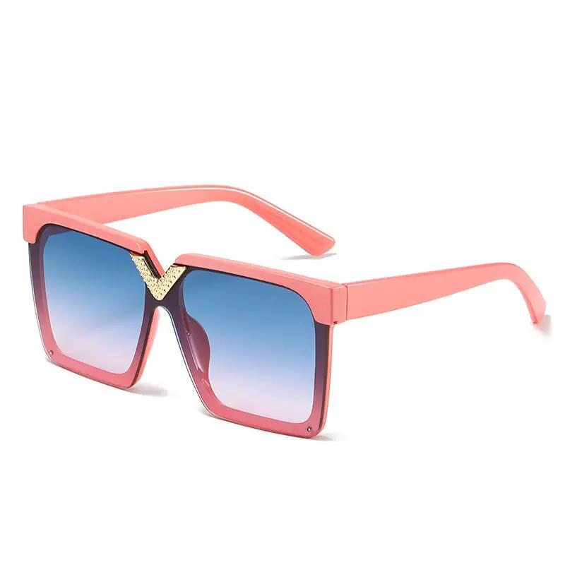 Sunglasses pink oversized square V-shaped for women with blue gradient lenses and gold bridge detail