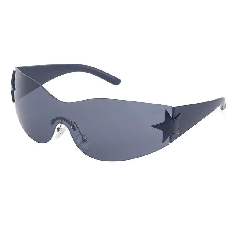 Rimless one-piece sunglasses with blue-gray shield lenses and star-embellished temples.