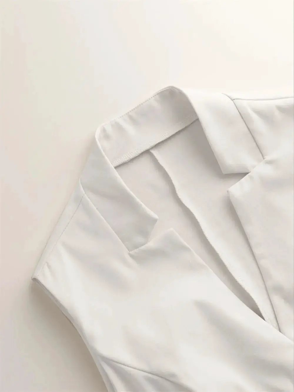 Button Down Vest Coat by eprolo, white tailored blazer with collar and pocket detail