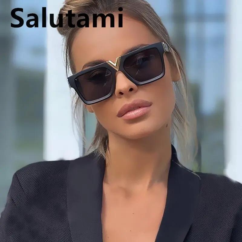 Square V-shaped oversized sunglasses, black frame with gold V accent and gradient lenses, by eprolo.