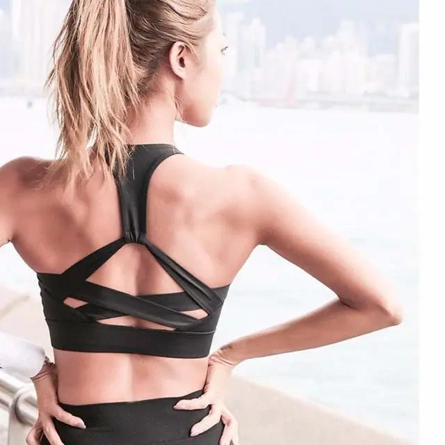 Black crisscross-back sports bra with hollow-out straps for gym and yoga