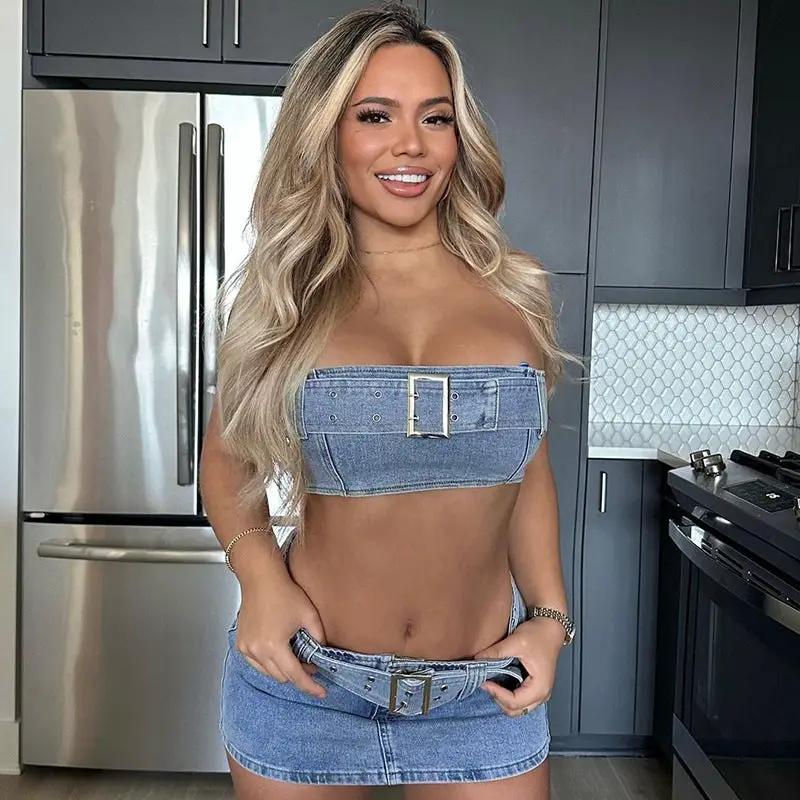 Women's two-piece denim tube top and mini skirt set in light blue with buckled belts; Oz-Direct.com